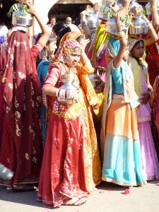 Procession of local girls in their saris