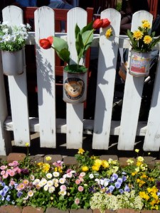 Duffy the Bear on a pail