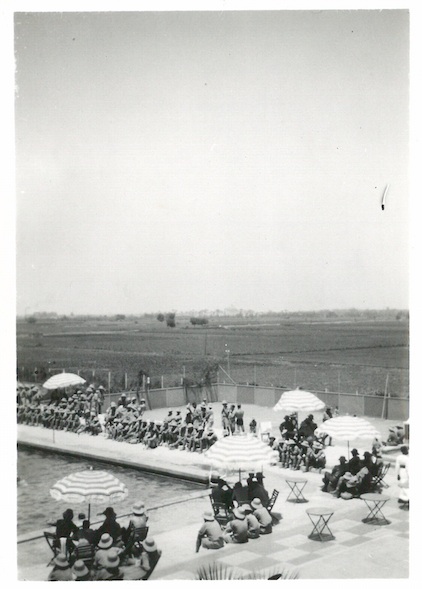 Boys watching swimming races - Mena Club - July 21 1941