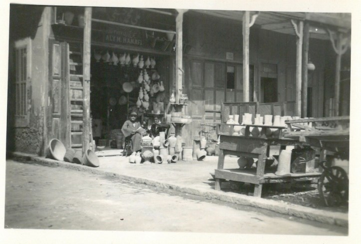 Earthen Worker(?) displaying wares 