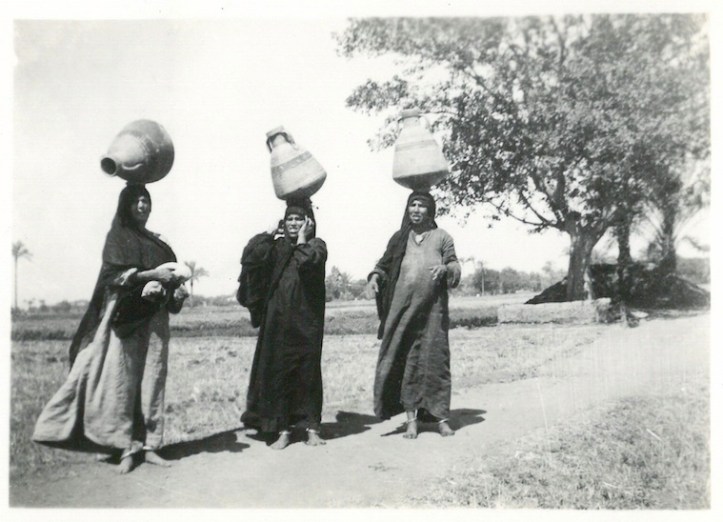 Women Balancing Water Containers