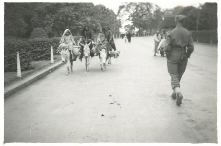 Women Riding Donkeys