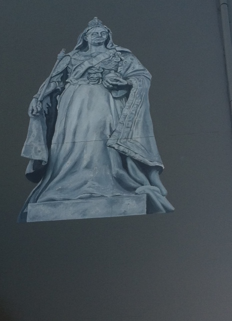 Queen Victoria painted on a building - it was hard to photograph due the low early morning sun but she looks a little zombie-like
