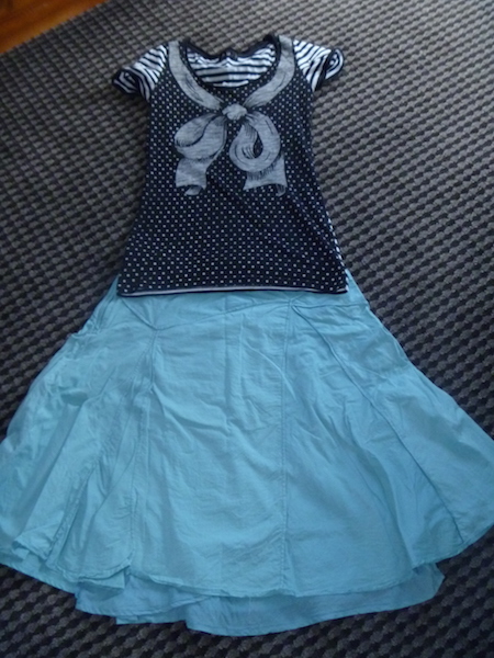 Patterned wear-once-and-leave t-shirt again with the teal skirt.