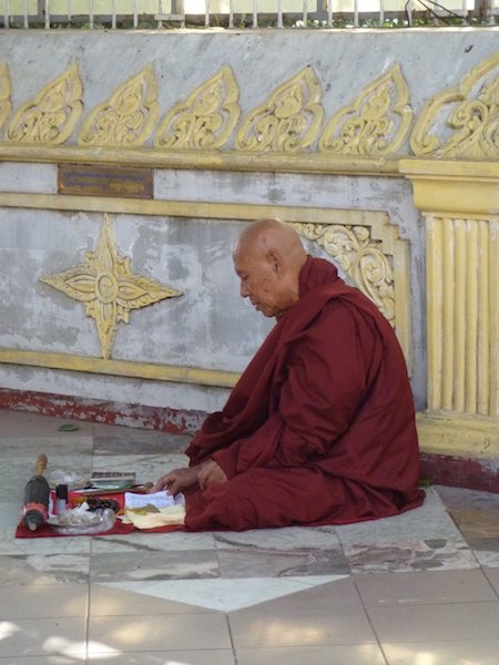 A monk in his burgundy robes