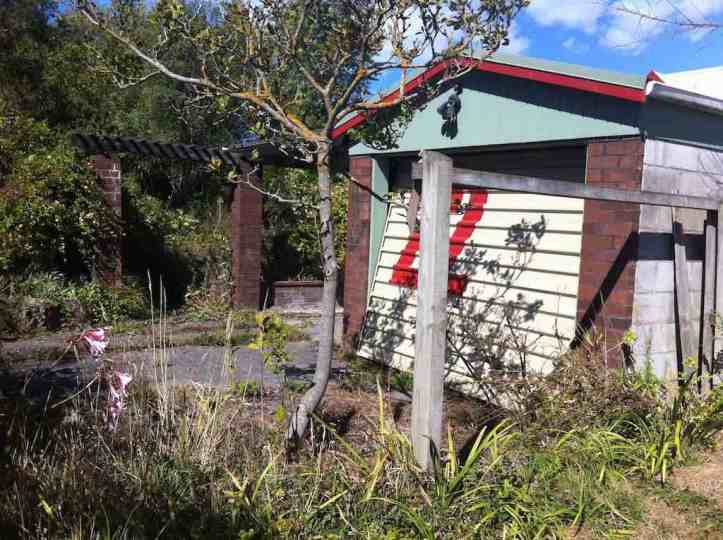 This garage had stuff left in it - old mattresses and cabinets