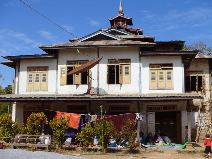 This building near the school appeared to have a community meeting going on outside