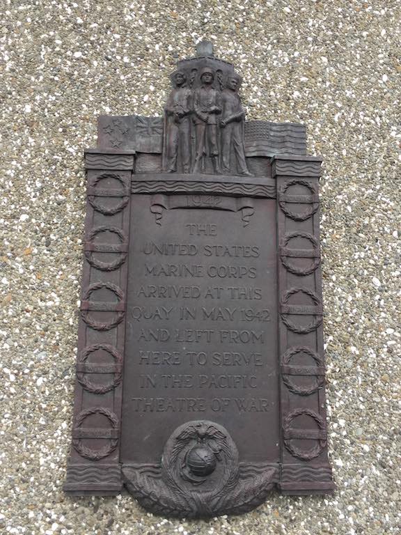 THE UNITED STATES MARINE CORP ARRIVED AT THIS QUAY IN MAY 1942 AND LEFT FROM HERE TO SERVE IN THE PACIFIC THEATRE OF WAR